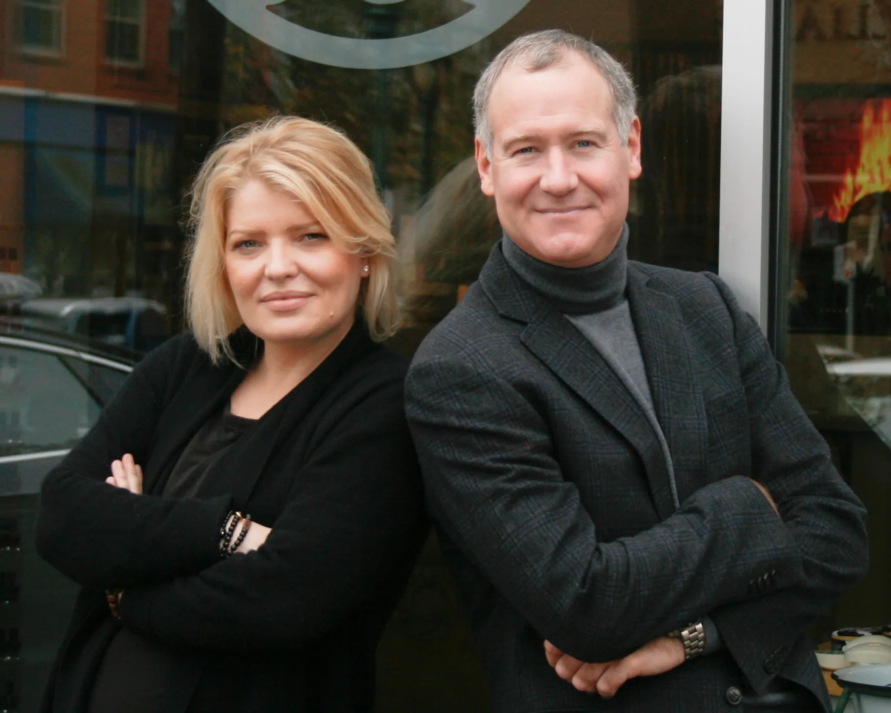 The co-owners of ESSpa standing together outside the spa in Aspinwall